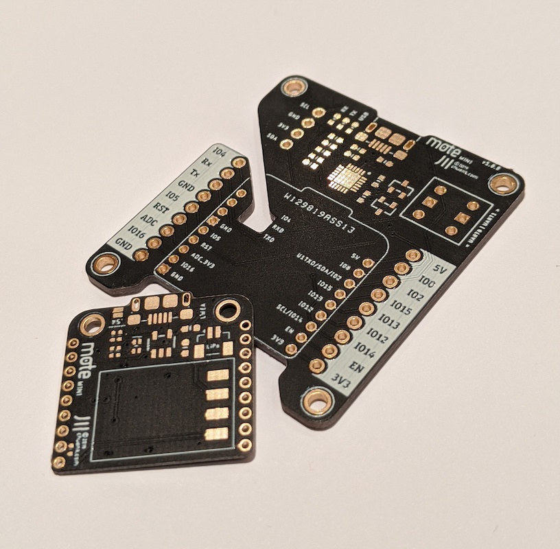 Bare PCBs of the mote mini and its programmer.